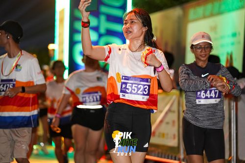 Race photo from PIK NITE RUN 2025