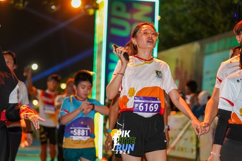 Race photo from PIK NITE RUN 2025
