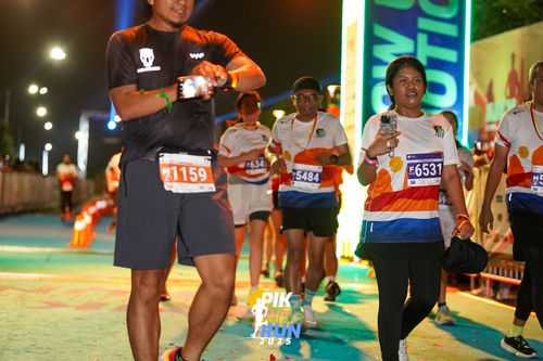 Race photo from PIK NITE RUN 2025
