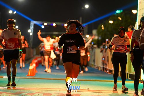 Race photo from PIK NITE RUN 2025