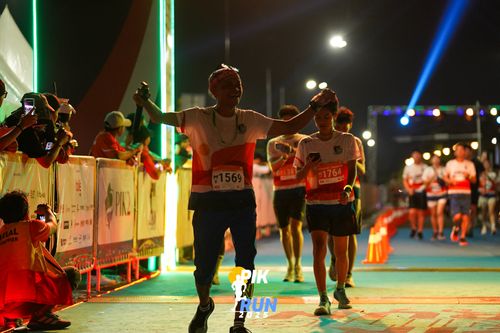 Race photo from PIK NITE RUN 2025
