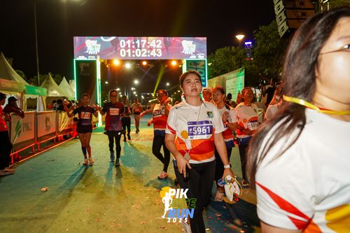 Race photo from PIK NITE RUN 2025