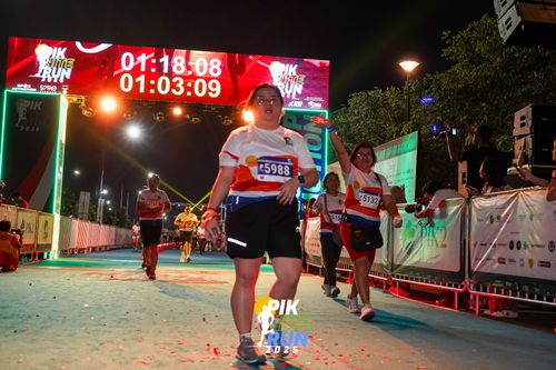 Race photo from PIK NITE RUN 2025