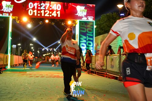 Race photo from PIK NITE RUN 2025
