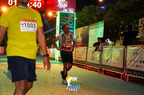Race photo from PIK NITE RUN 2025