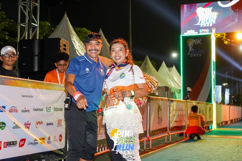 Race photo from PIK NITE RUN 2025