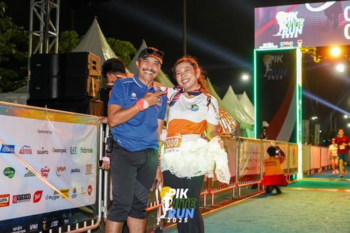 Race photo from PIK NITE RUN 2025