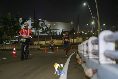 Race photo from PIK NITE RUN 2025
