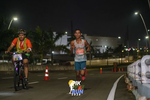 Race photo from PIK NITE RUN 2025