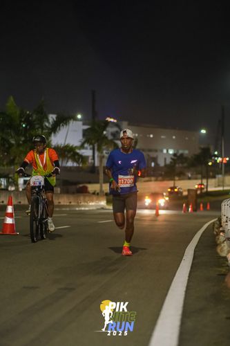 Race photo from PIK NITE RUN 2025