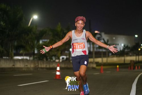 Race photo from PIK NITE RUN 2025