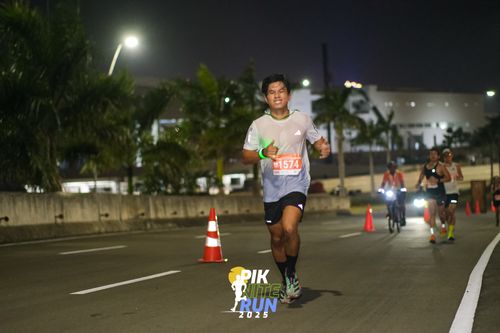 Race photo from PIK NITE RUN 2025