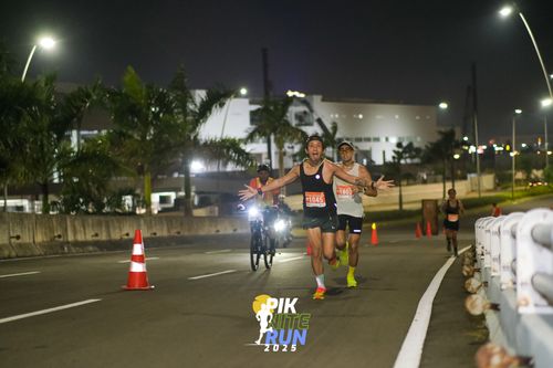 Race photo from PIK NITE RUN 2025