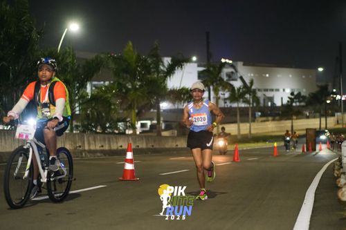Race photo from PIK NITE RUN 2025