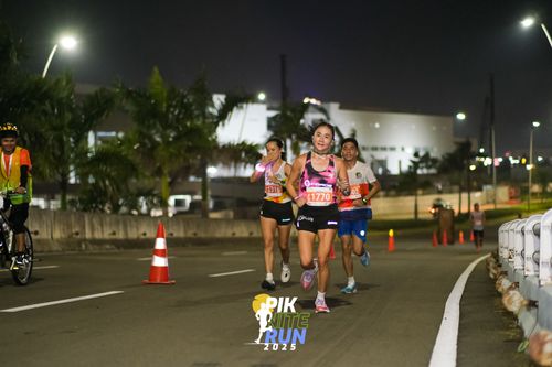 Race photo from PIK NITE RUN 2025