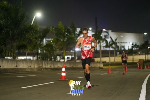 Race photo from PIK NITE RUN 2025
