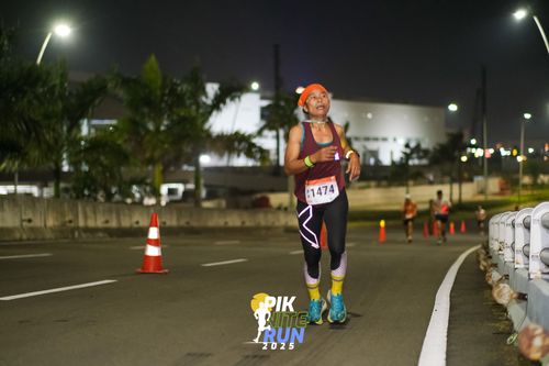 Race photo from PIK NITE RUN 2025
