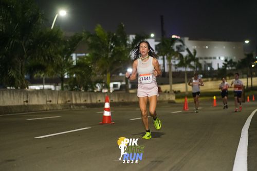Race photo from PIK NITE RUN 2025