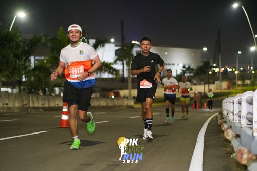 Race photo from PIK NITE RUN 2025