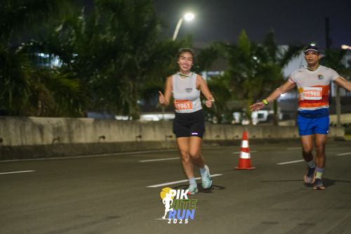 Race photo from PIK NITE RUN 2025