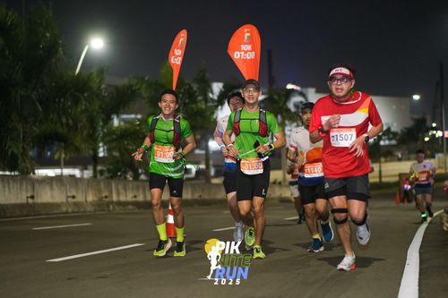 Race photo from PIK NITE RUN 2025
