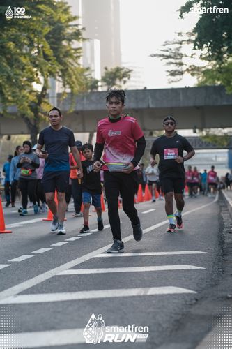 Race photo from Smartfren Run 2025 