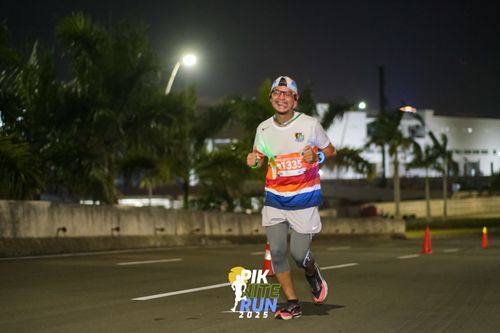 Race photo from PIK NITE RUN 2025