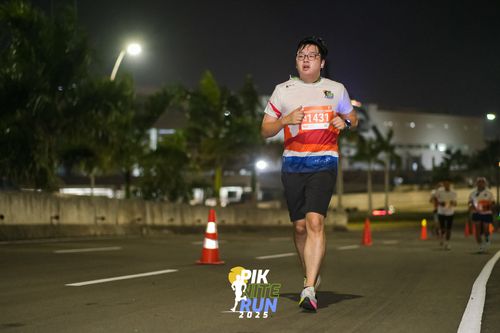 Race photo from PIK NITE RUN 2025