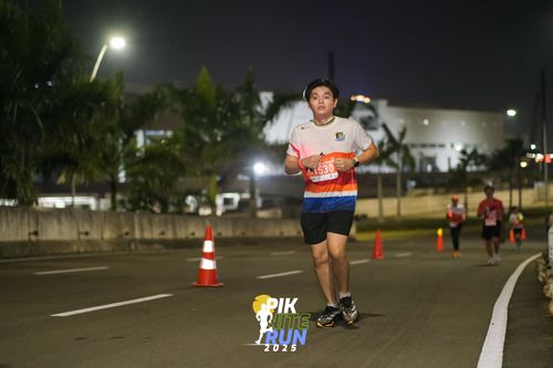 Race photo from PIK NITE RUN 2025