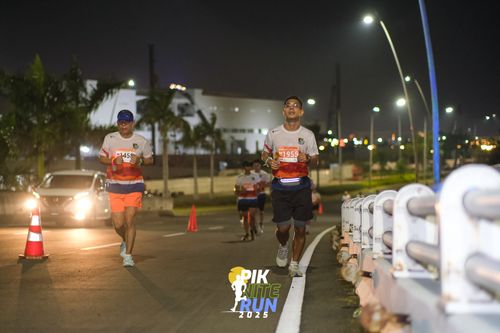 Race photo from PIK NITE RUN 2025