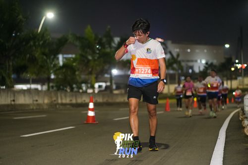 Race photo from PIK NITE RUN 2025