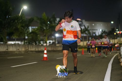 Race photo from PIK NITE RUN 2025