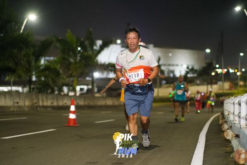 Race photo from PIK NITE RUN 2025