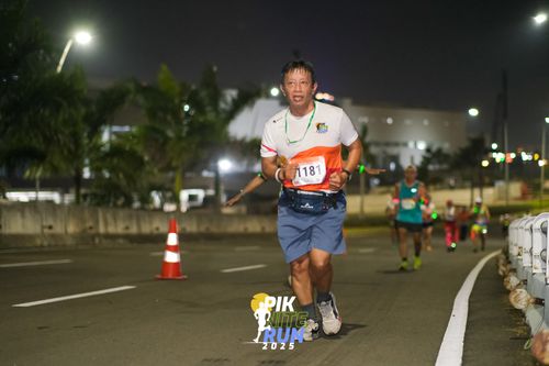 Race photo from PIK NITE RUN 2025