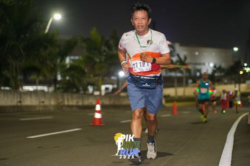 Race photo from PIK NITE RUN 2025