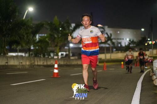 Race photo from PIK NITE RUN 2025