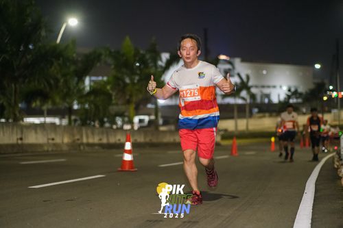 Race photo from PIK NITE RUN 2025