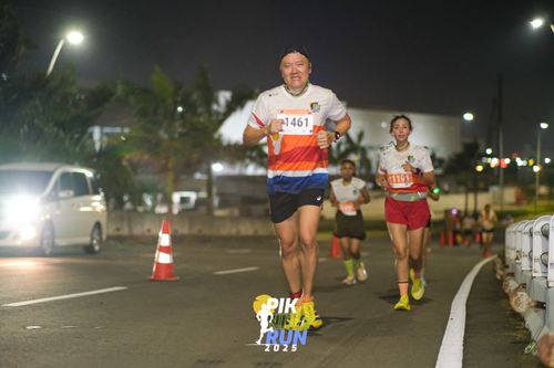 Race photo from PIK NITE RUN 2025