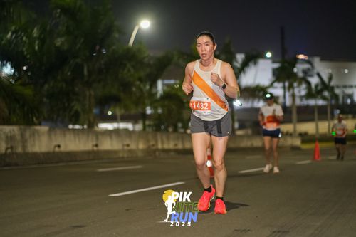 Race photo from PIK NITE RUN 2025