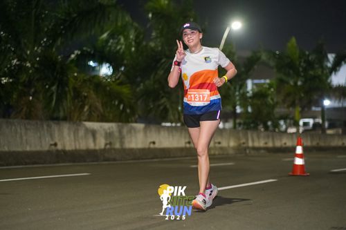 Race photo from PIK NITE RUN 2025