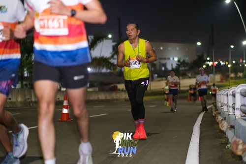 Race photo from PIK NITE RUN 2025