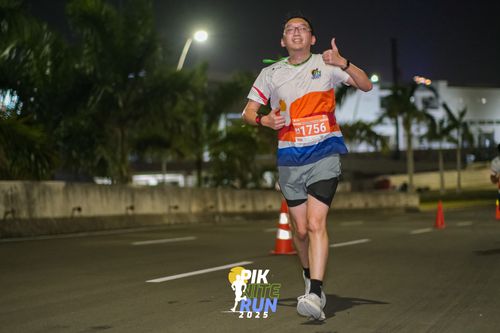 Race photo from PIK NITE RUN 2025