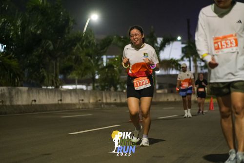 Race photo from PIK NITE RUN 2025