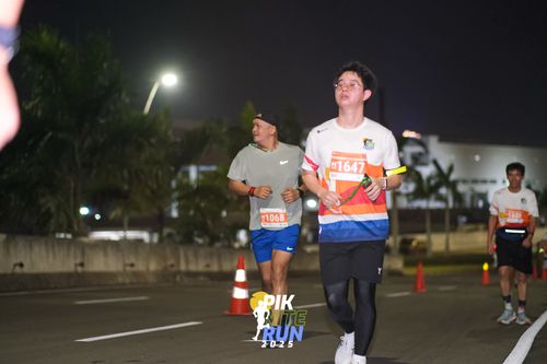 Race photo from PIK NITE RUN 2025