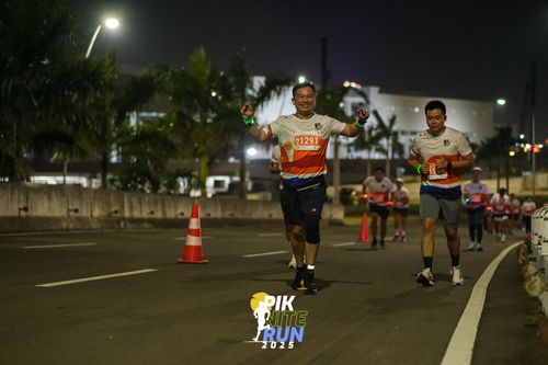 Race photo from PIK NITE RUN 2025