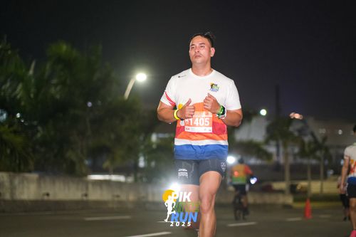 Race photo from PIK NITE RUN 2025