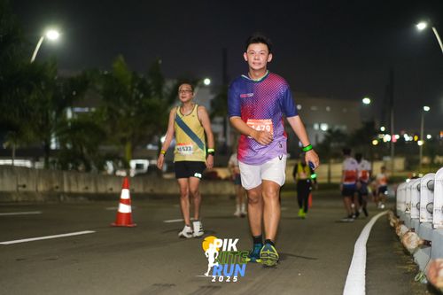 Race photo from PIK NITE RUN 2025
