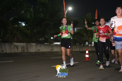 Race photo from PIK NITE RUN 2025