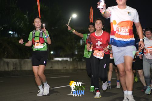 Race photo from PIK NITE RUN 2025