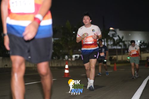Race photo from PIK NITE RUN 2025